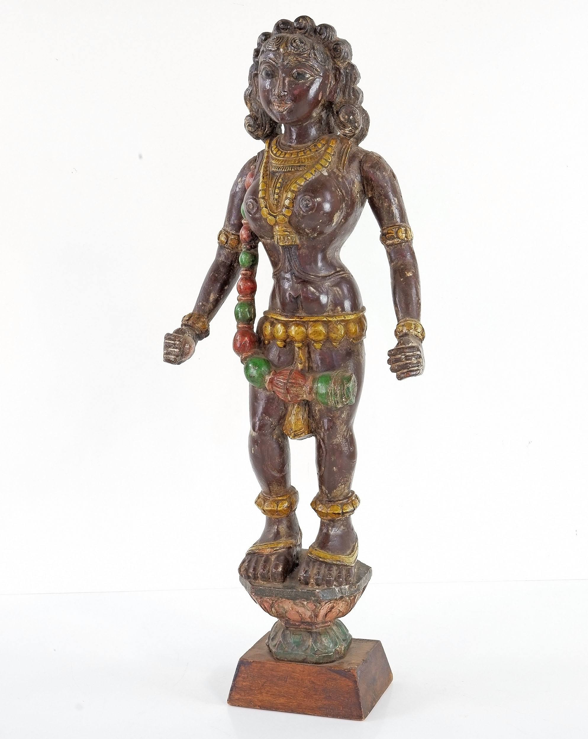 'Antique Indian Carved and Polychromed Wood Figure of the Ogress Putana'