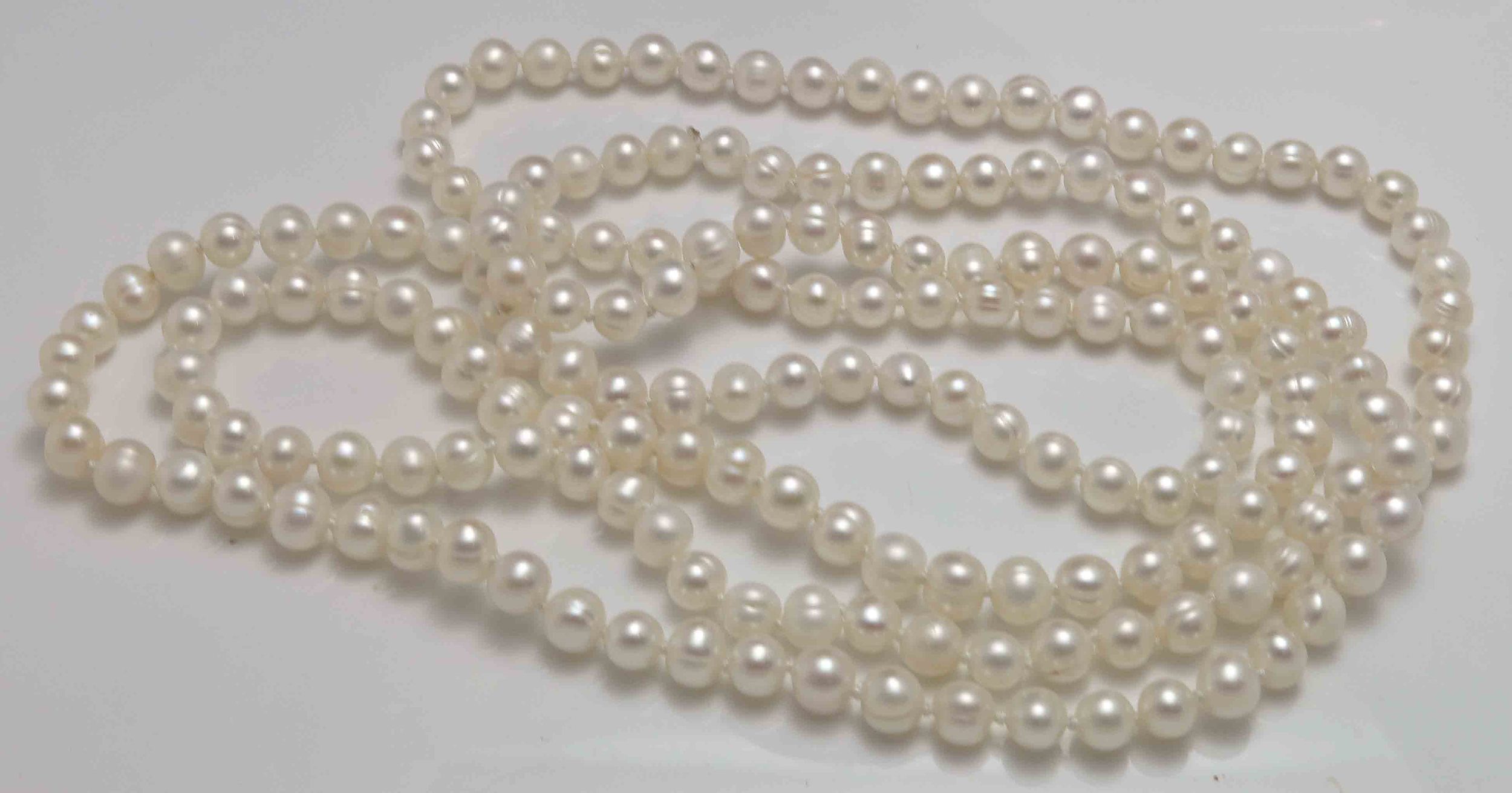 Extra Long Pearl Necklace - Lot 1090110 | ALLBIDS