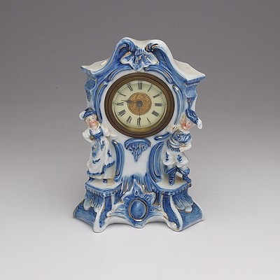 A Blue and White Porcelain Clock, A Faux Tortoiseshell Clock and Sterling Silver and Enamel Compact