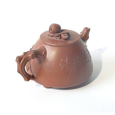 A Chinese Yixing Ceramic Teapot and Lid with Moving Squirrel Head Decoration and Six Cups