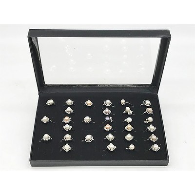 30 Pearl Rings in a clear lidded ring display tray