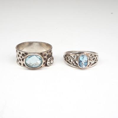Two Sterling Silver Rings with Oval Facitted Topaz