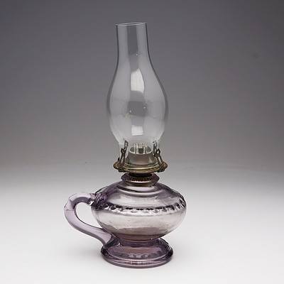 Clear Glass Finger Oil Lamp with Amethyst Colouring From Sunlight