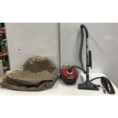 Two Vacuum Cleaners and Inflatable Mattress