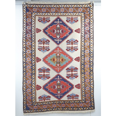 Vintage Caucasian Kazak Hand Knotted Wool Pile Rug with Three Medallions on Cream Field