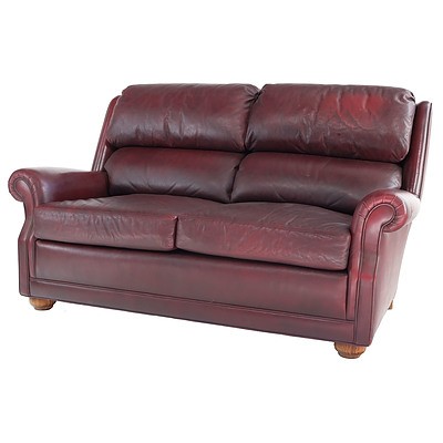 Moran Burgundy Leather Upholstered Two Seater Lounge