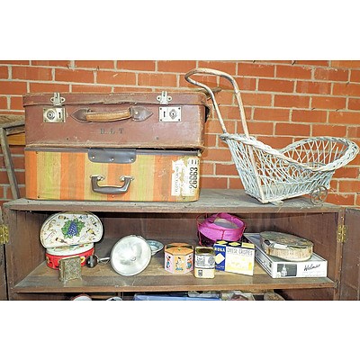Contents of Cupboard, Including Two Vintage Suitcases and an Early Dolls Pram