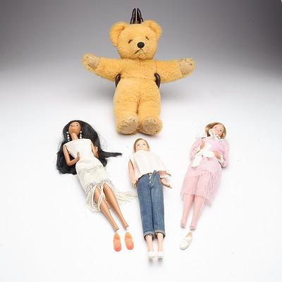 Three Vintage  Barbie Dolls and One Vintage Teddy Bear