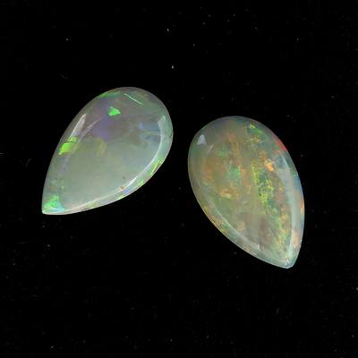 Pair of White Opal Tear Drops, 0.80ct