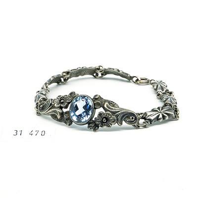 Sterling Silver and Marcasite Floral Bracelet Set with Oval Faceted Blue Topaz