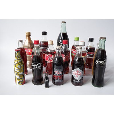 Group of Filled Coca Cola Bottles