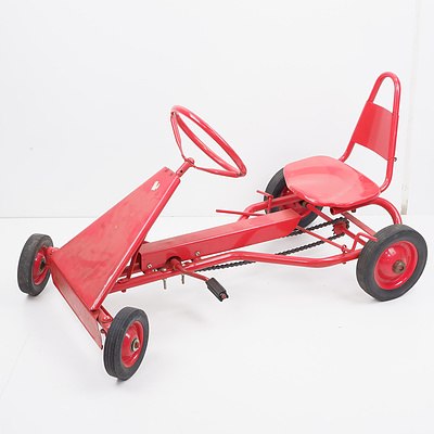 Small Red Pedal Cart with Steering and Brake