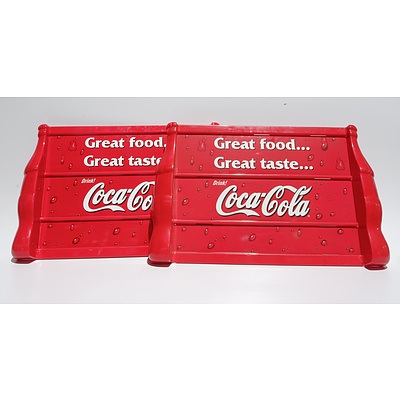 Three Plastic Coca Cola Signs