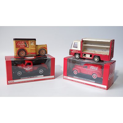 Four Coca Cola Model Cars and Trucks