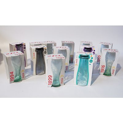 Group of Boxed Coca Cola McDonalds Glasses Depicting Various Years of Production