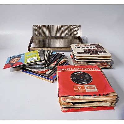 Quantity of Approximatley 55 7 Inch Single Records Including Elvis, The Beatles and More and Vintage Copper Record Rack