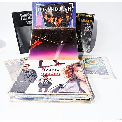 16 Vinyl 12 Inch Records Including INXS - Kick, Duran Duran - Arena, Patti Smith, Supertramp and More