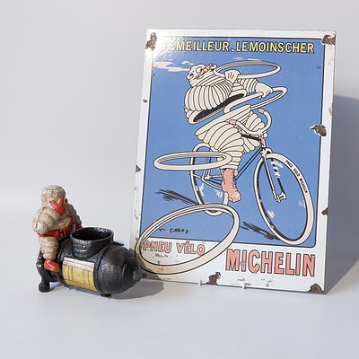French Michelin Enamelled Tin Sign and a Cast Iron Michelin Novelty Figure, Modern