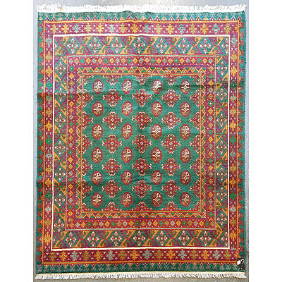 Persian Turkoman Hand Knotted Wool Pile Rug with a Green Ground
