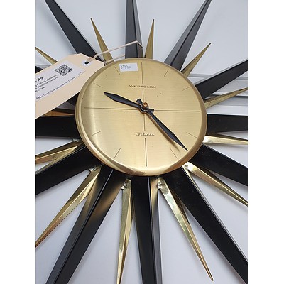 Striking Painted Metal and Brass Westclox Starburst Wall Clock
