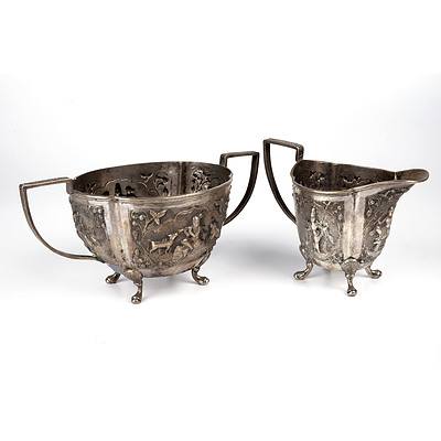 Antique Indian Colonial Hand Wrought Solid Silver Sugar Bowl and Jug, the Latter Decorated with Lakshmi Standing on a Lotus