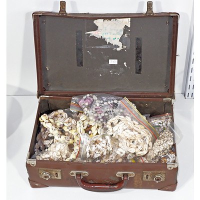 Vintage Suitcase With Various Shell Necklaces
