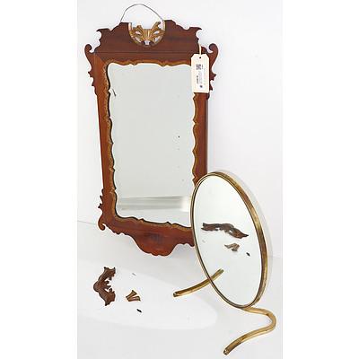 One Georgian Style Mahogany Mirror with Carved and Gilded Surround and One Oval Mirror in Brass Surround