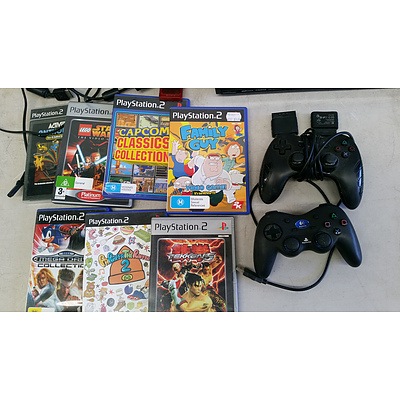 Panasonic DVD Recorder and Playstation 2 Console with Six Games and Controllers