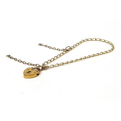 9ct Yellow Gold Curb link Bracelet with Heart Lock and Safety Chain, 2g