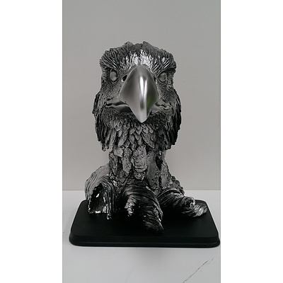 Composite eagle head statue