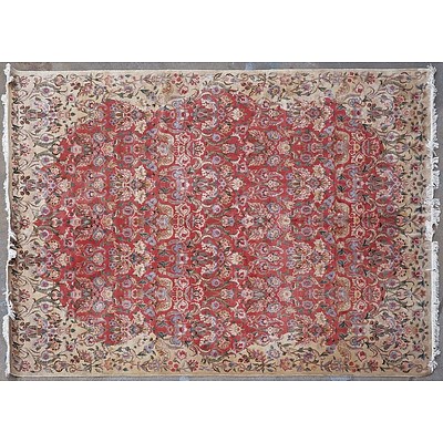 Large Persian Qum Finely Hand Knotted Wool Pile Floral Medallion Carpet with a Pinkish Red Ground