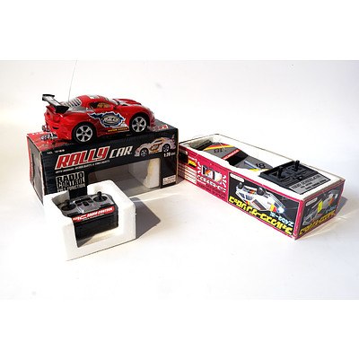 Two 1:20 Scale Remote Control Cars in Boxes with Controllers Including  Volkswagen Scirocco Z40 Turbo