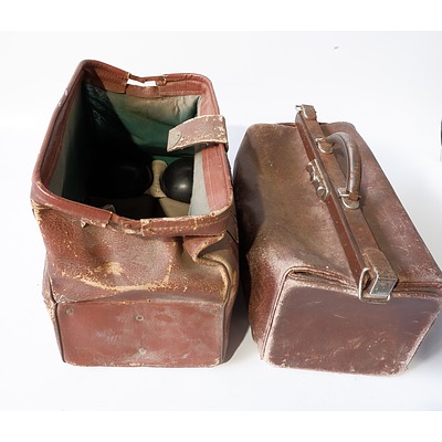Two Gladstone Bags with Four Lawn Bowls