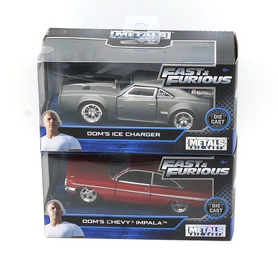 Two Jada Boxed Diecast Fast and Furious Cars, Including Dom's Ice Charger and Dom's Chevy Impala