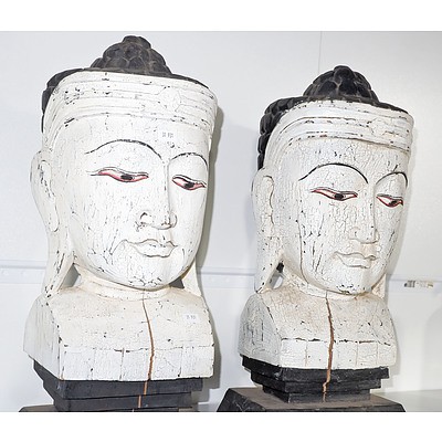 Pair of Carved and Painted Buddha Heads