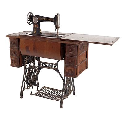 Antique Oak and Cast Metal Singer Treadle Sewing Table with Singer Sewing Machine