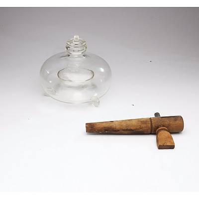 A Victorian Era Glass Fly Trap and Vintage Wooden Beer Tap