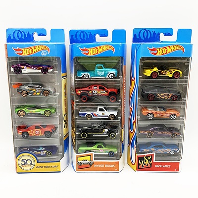 Three Sets of Hot Wheels 5-Pack Model Cars - 50 Challenging The Limits Since 1968, HW Flames and HW Hot Trucks