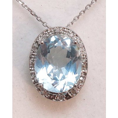 Sterling Silver Topaz And Diamond Pendant