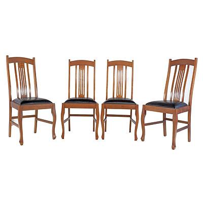 Set of Four Queensland Maple Dining Chairs with Black Vinyl Upholstered Seats, Early 20th Century