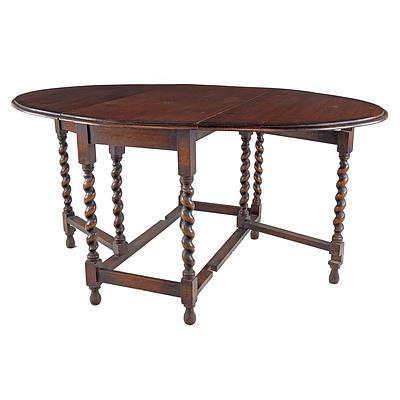 English Oak Jacobean Revival Oval Dropside Table, Early 20th Century