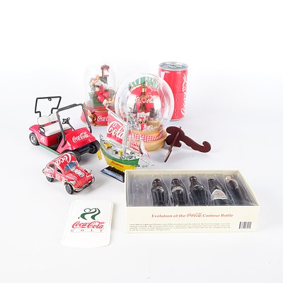 Group of Coca Cola Novelty Items, Including Transformer, Clock, Cars, and More