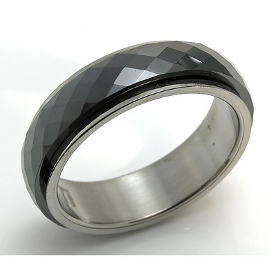Titanium Ring With Facetted Black Ceramic Spinning Centre