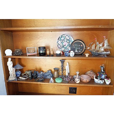 Two Shelves of Various Collectables From Around the World, Including Lladro