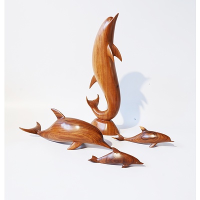 Four Teak Dolphin Carvings from Bouganville Island