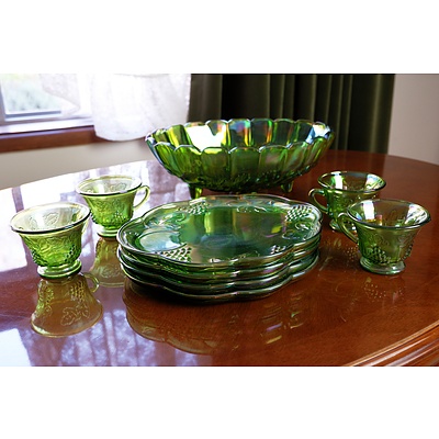 A Group of Green Carnival Glass, Including Large Bowl, Cups and Serving Plates