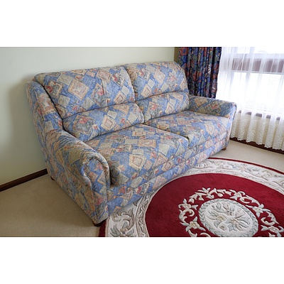 Two Seater Floral Upholstered Couch with Fold Out Bed