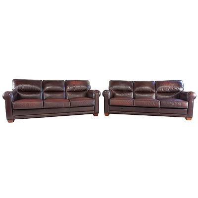 Pair of Moran Burgundy Leather Upholstered Lounges