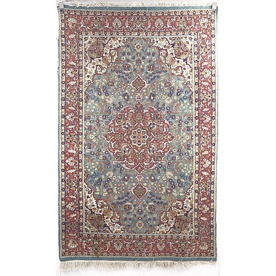 Persian Hand Knotted Wool Pile Rug with Central Medallion on a Blue Ground