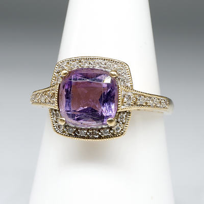 9ct Yellow Gold Ring with a Cushion Cut Pale Amethyst and Round Brilliant Cut Diamonds, 3.9g